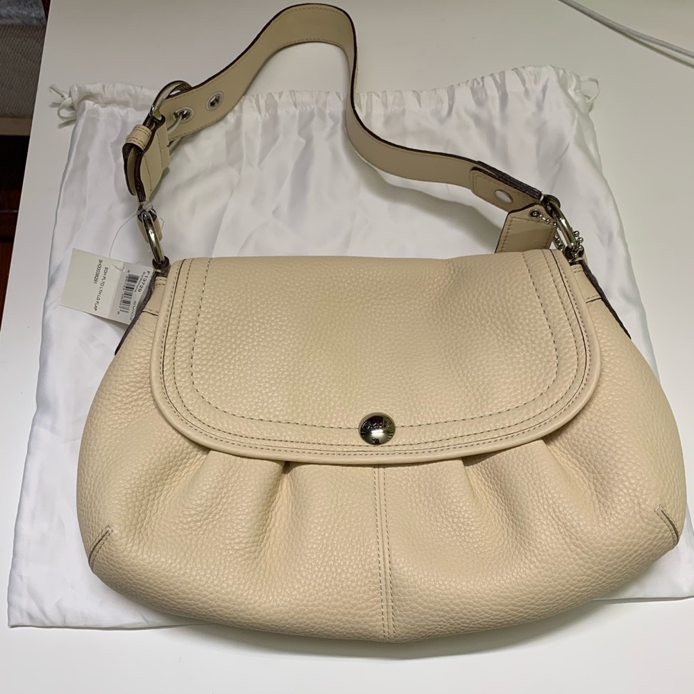coach cream bag